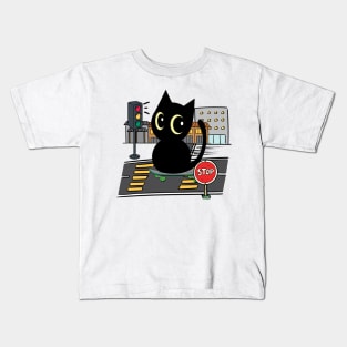 Funny black cat is on a skateboard Kids T-Shirt